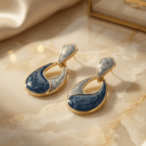 Elegant blue and grey marble drop earrings with gold accents. Perfect for stylish accessories and je.